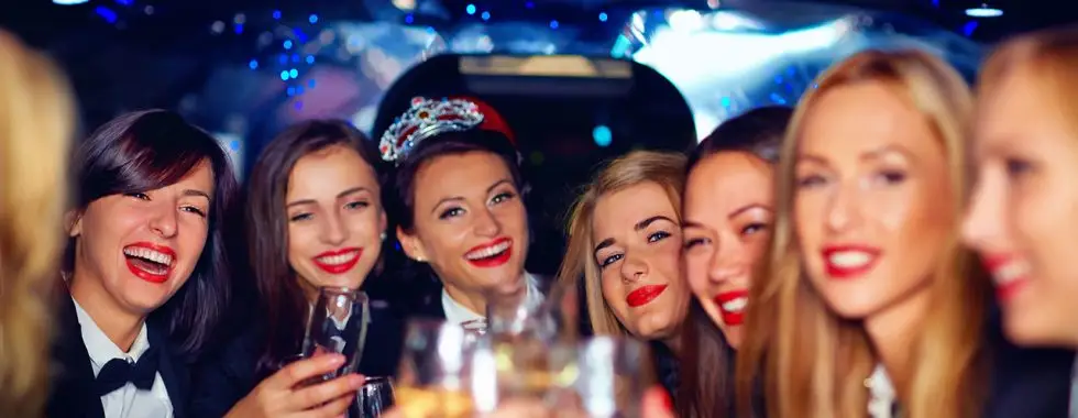 a group of women in a limo